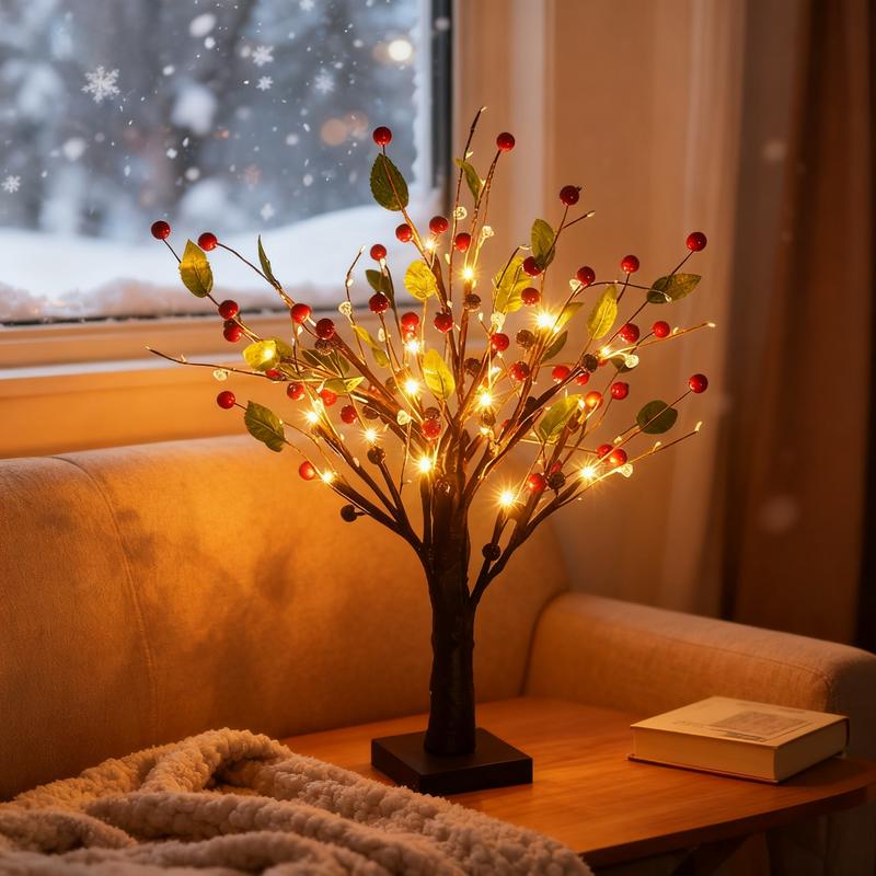 Decorative LED tree on a table with a cozy indoor setting