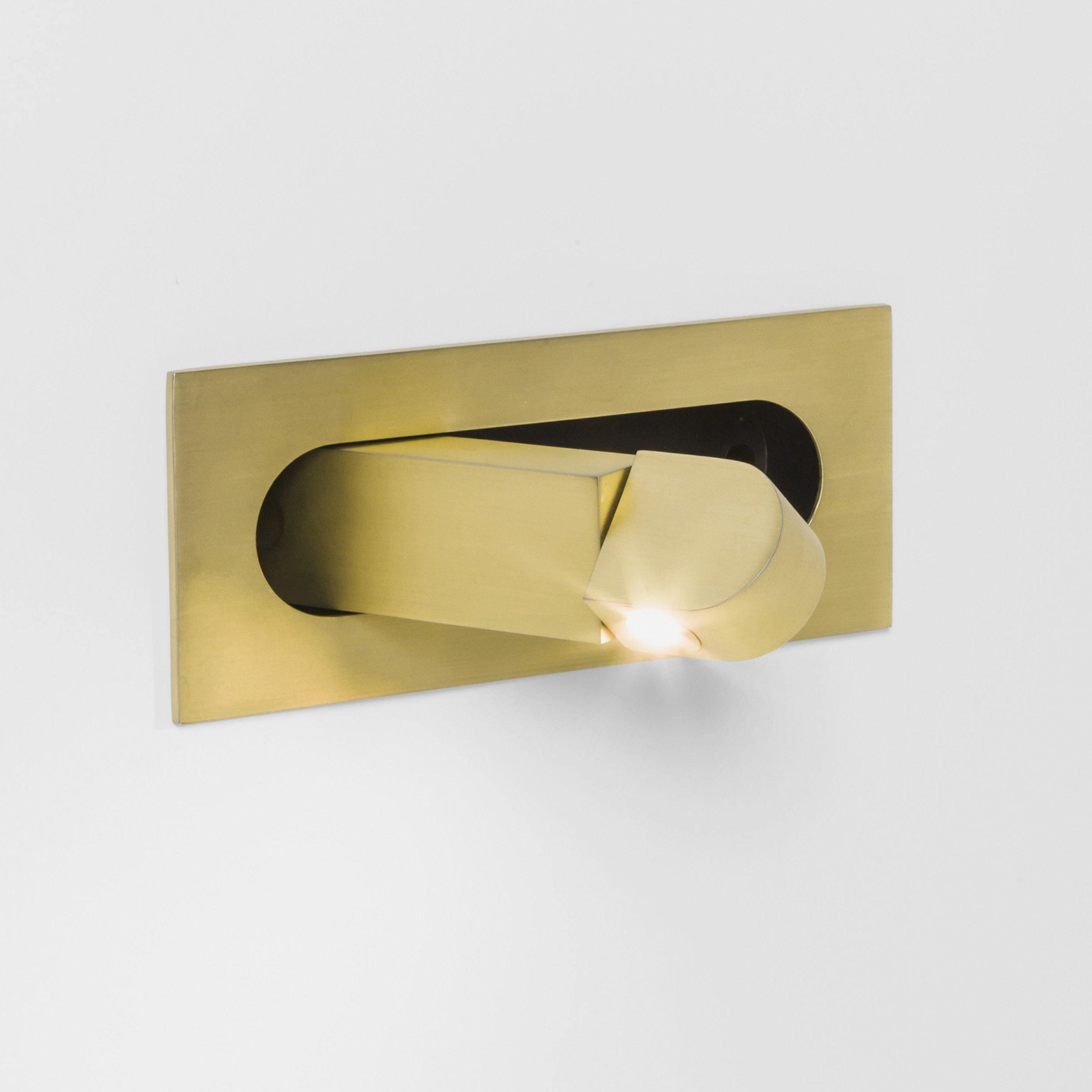 Gold door handle on a white background