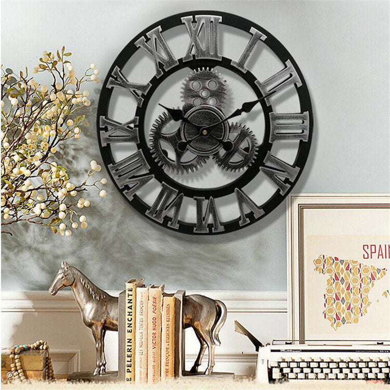 Decorative wall clock with Roman numerals on a wall with books and a horse statue below.