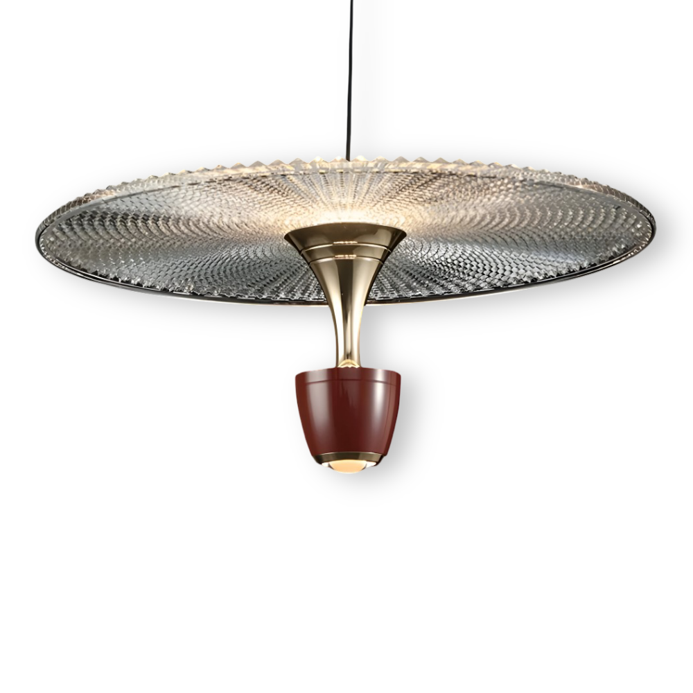 Modern pendant light with decorative glass shade on a white background