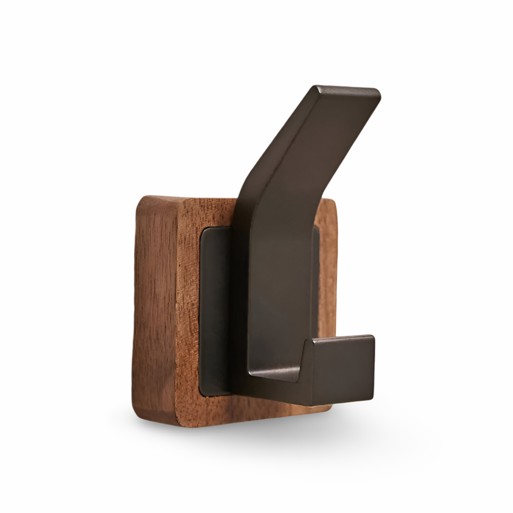 Wooden wall hook with metal bracket on a white background