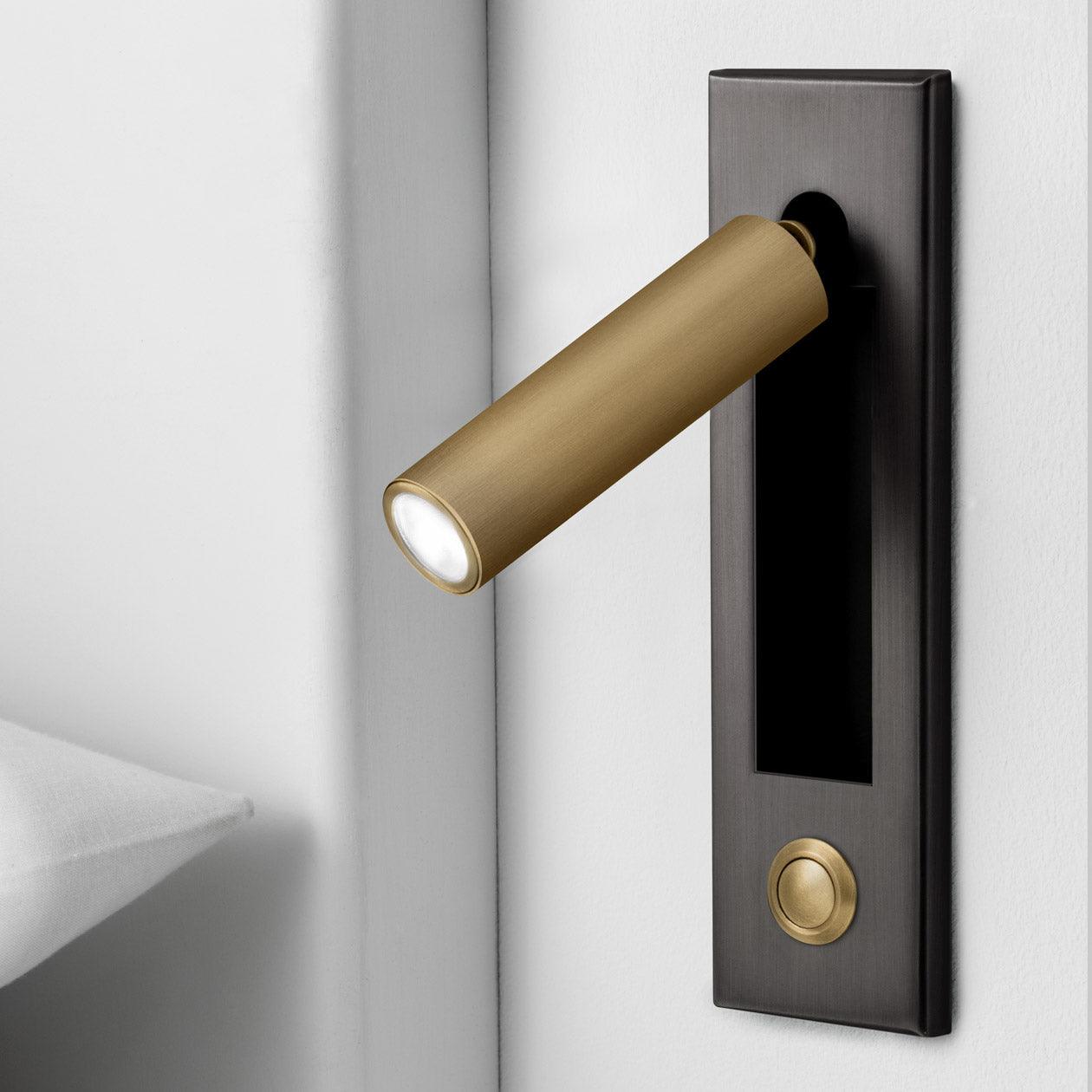 Modern door handle with built-in light on a white door