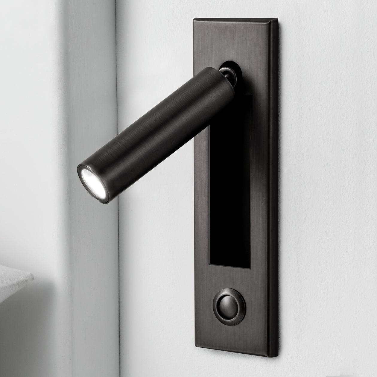 Black door handle with light on a white background