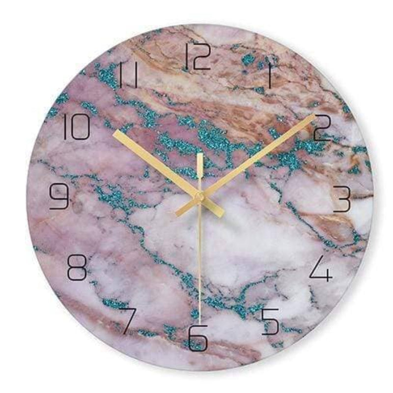 Marble-patterned clock with gold hands on a white background