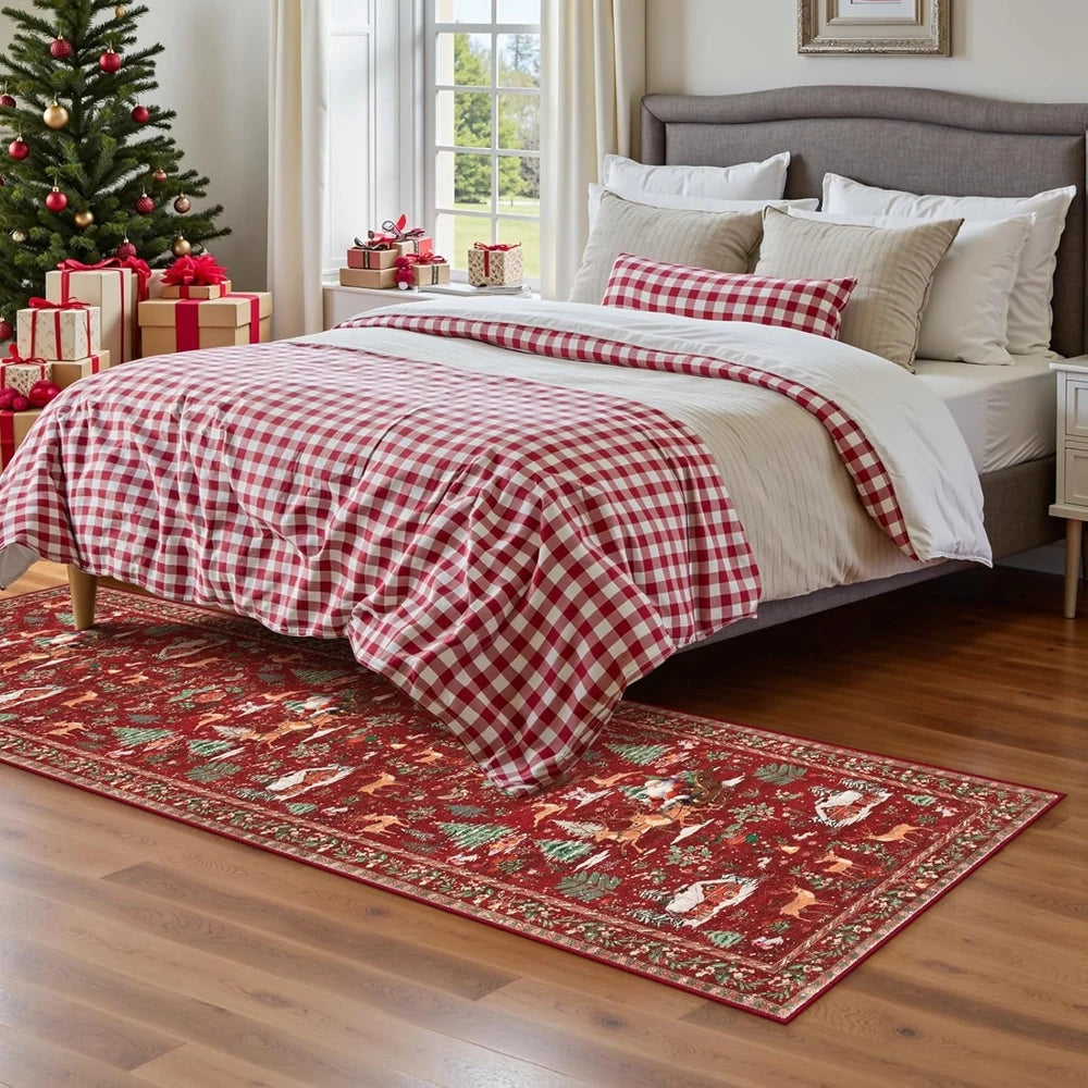 Bedroom with a bed covered in red and white checkered bedding, Christmas tree, and presents.