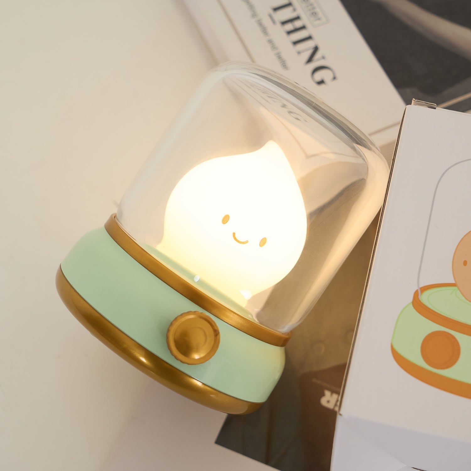 Cute night light with a smiley face on a white surface