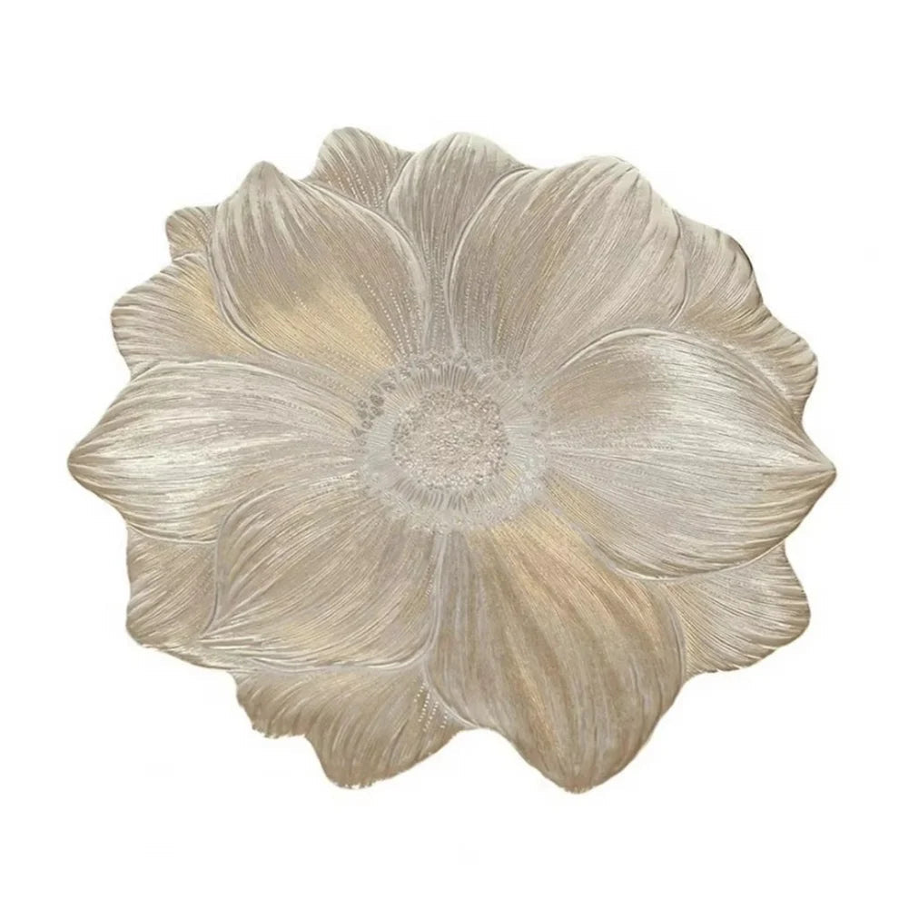 Decorative wall art with a floral design on a white background
