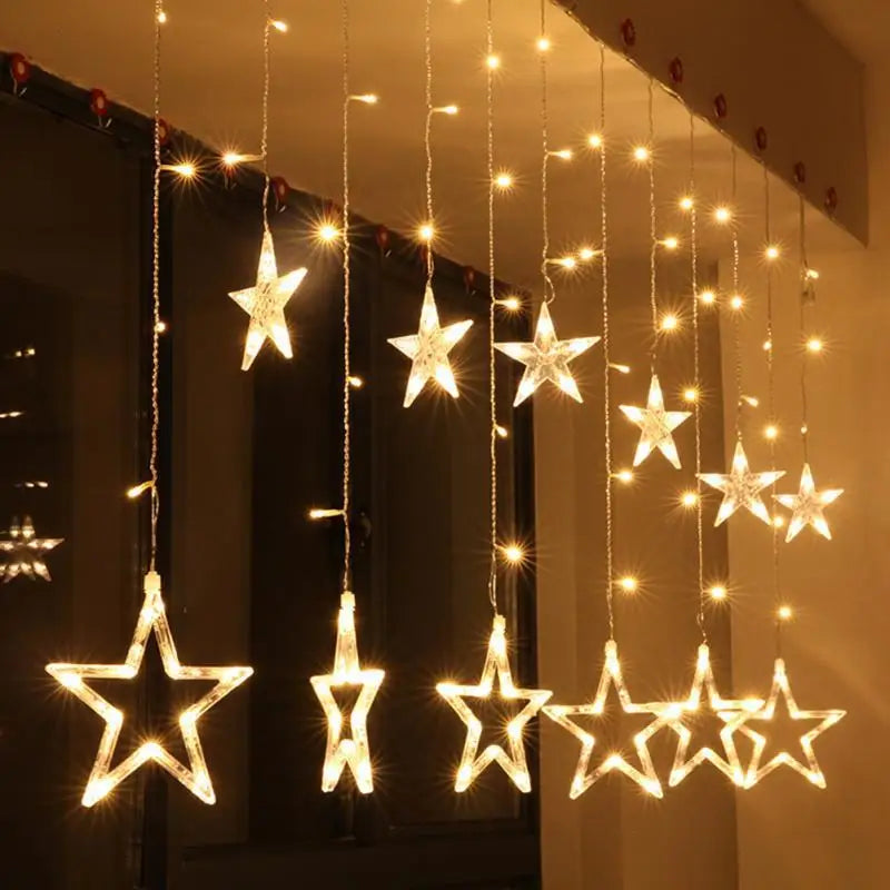 Star-shaped string lights hanging against a dark background