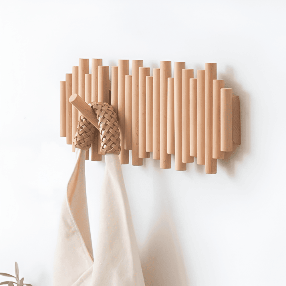 Wooden wall hook with a woven design on a white background