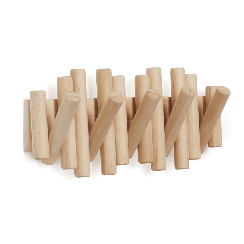 Wooden wall-mounted coat rack with multiple hooks on a white background