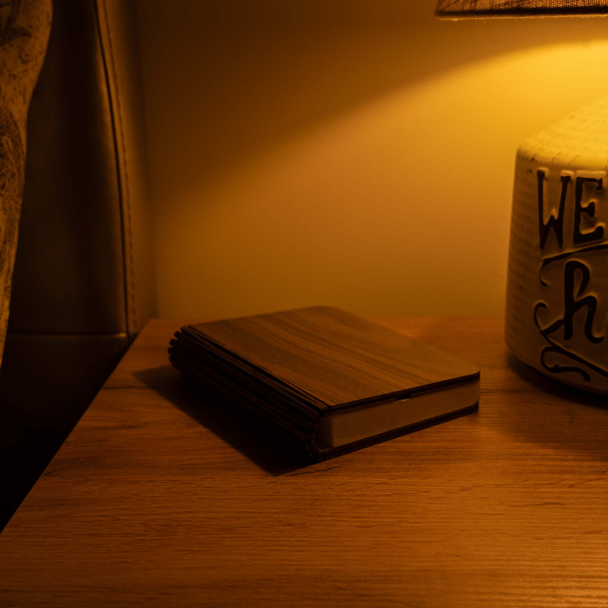 Wooden box on a wooden surface with warm lighting