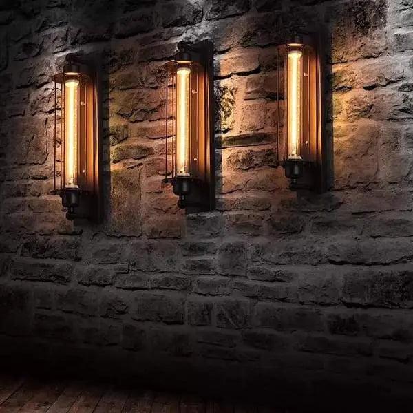 Three wall-mounted lights on a stone wall
