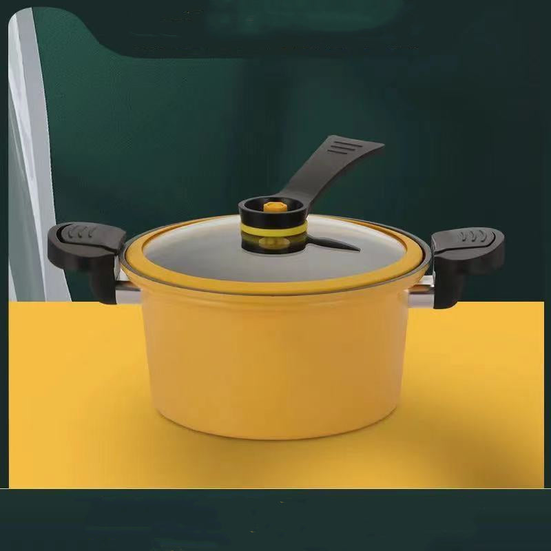 Yellow pot with a lid and black handles on a green background