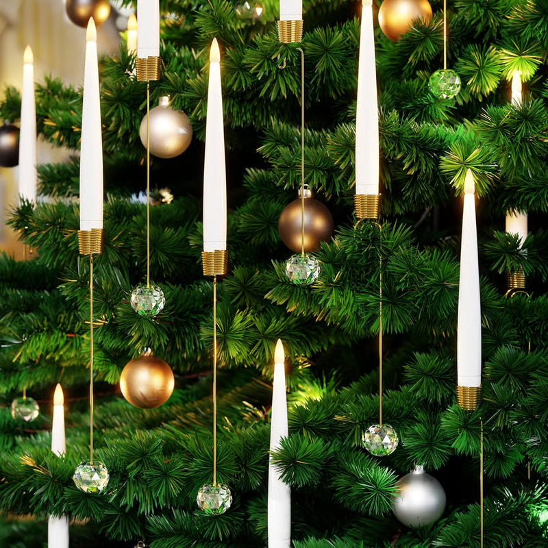 Decorative Christmas tree with hanging candles, ornaments, and lights.