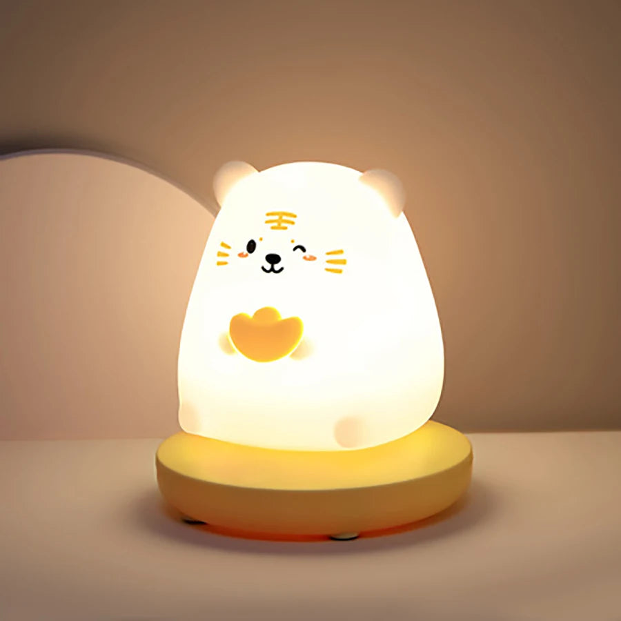 Cute animal-shaped night light on a neutral background