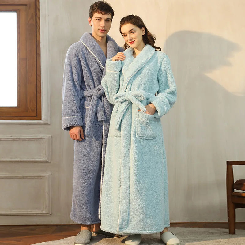 Two people wearing plush bathrobes in a home setting.