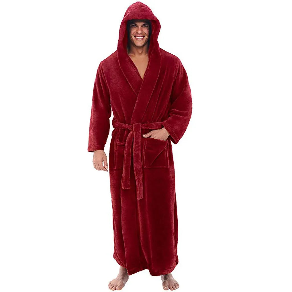 Man wearing a red hooded robe on a white background