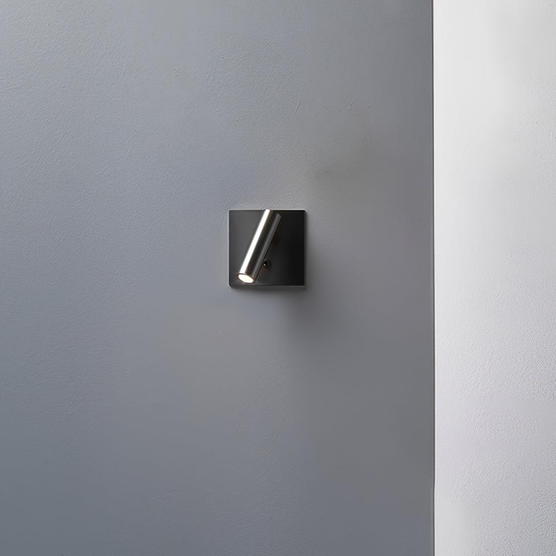 Modern wall light fixture on a gray wall