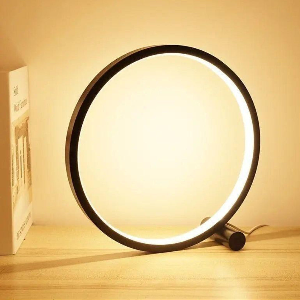 Circular light on a wooden surface with a soft glow