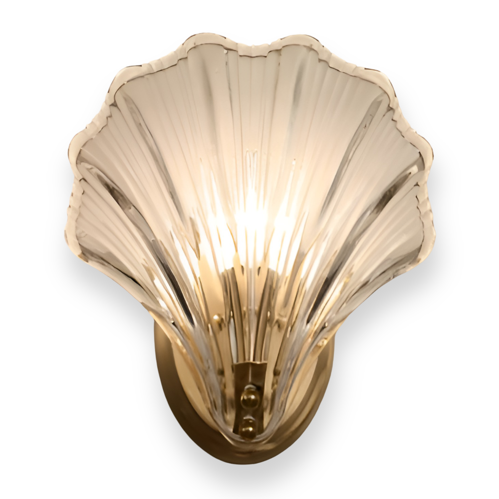 Shell-shaped wall light fixture on a white background