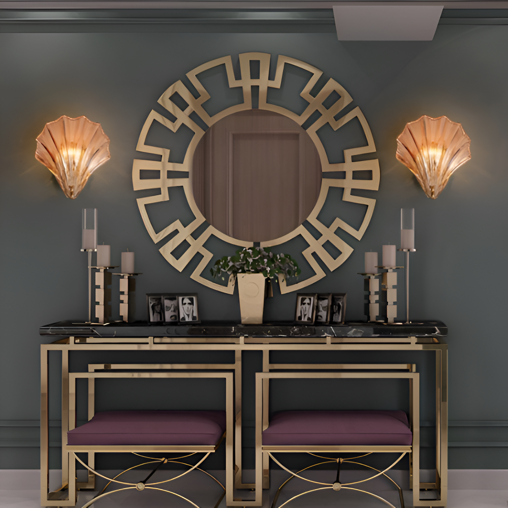 Decorative console table with mirror, chairs, and wall lights in a room.