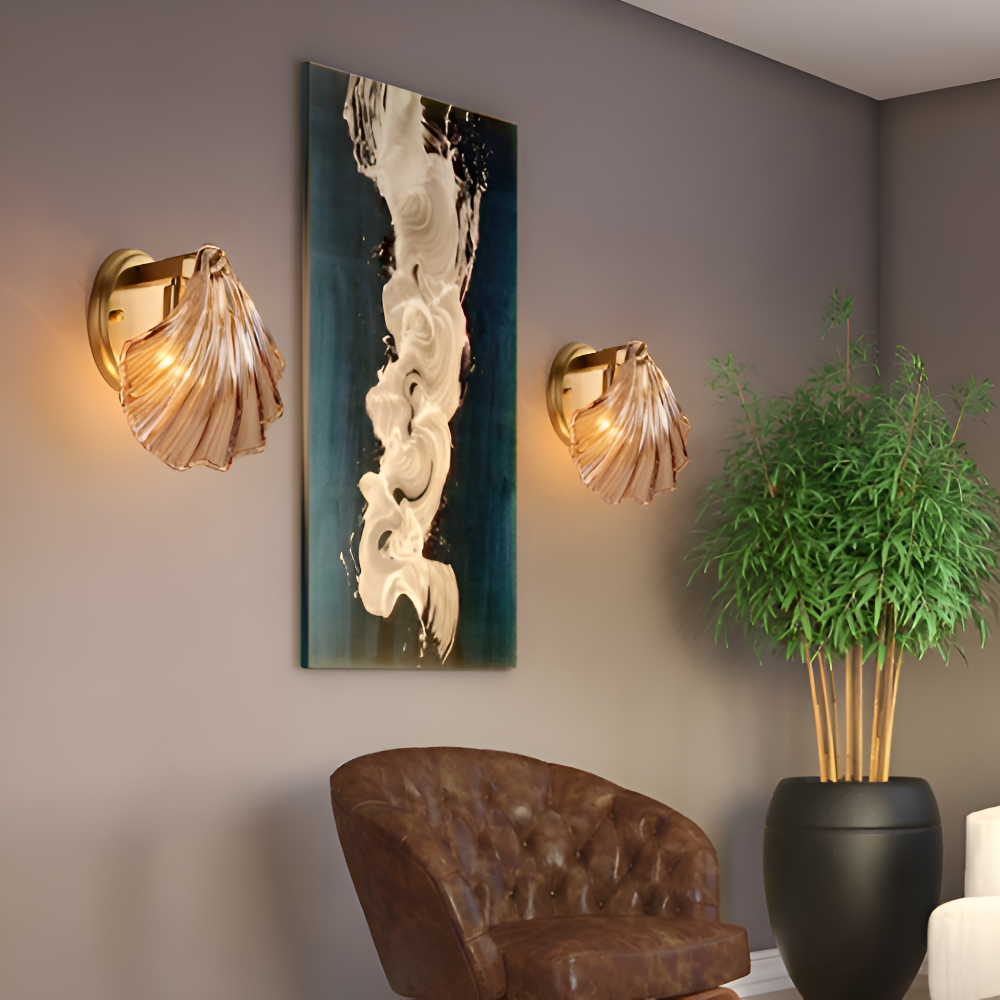Modern interior design with wall art, sconces, and a plant.