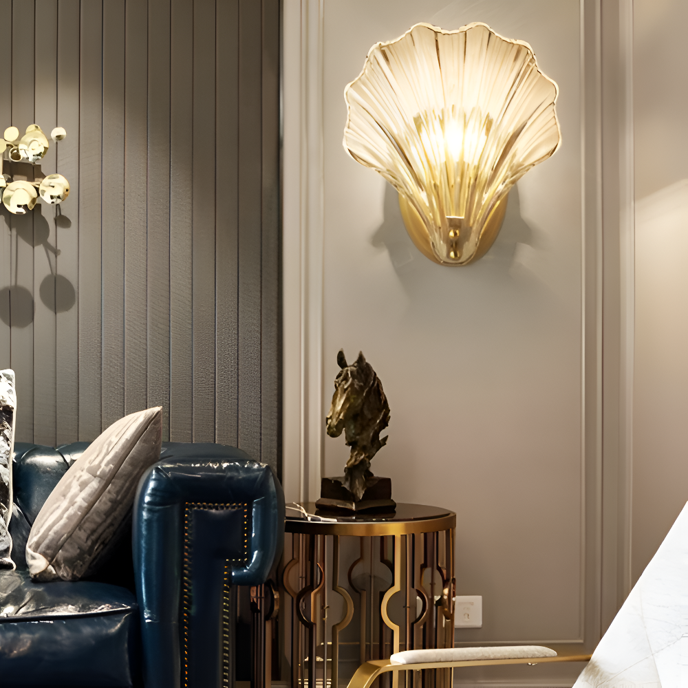 Decorative wall sconces in a living room setting with a horse statue on a table.