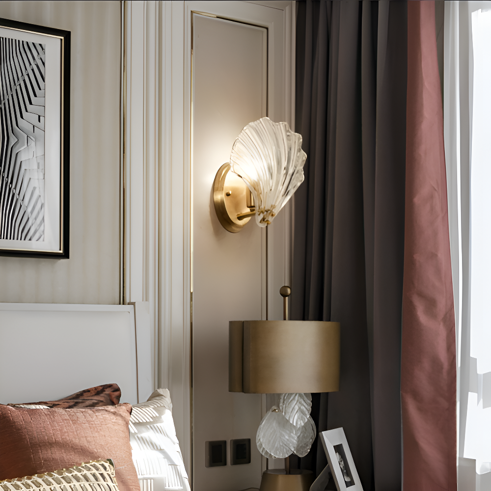 Decorative wall sconce in a bedroom setting with a lamp and framed art.