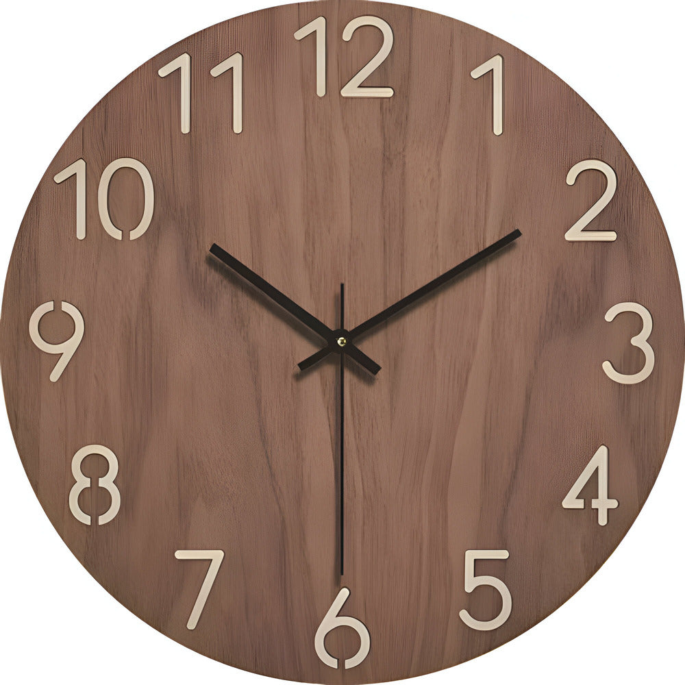 Wooden wall clock with black hands and white numbers on a white background
