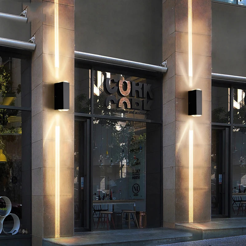 Modern building entrance with 'Cork & Co' sign and illuminated walls