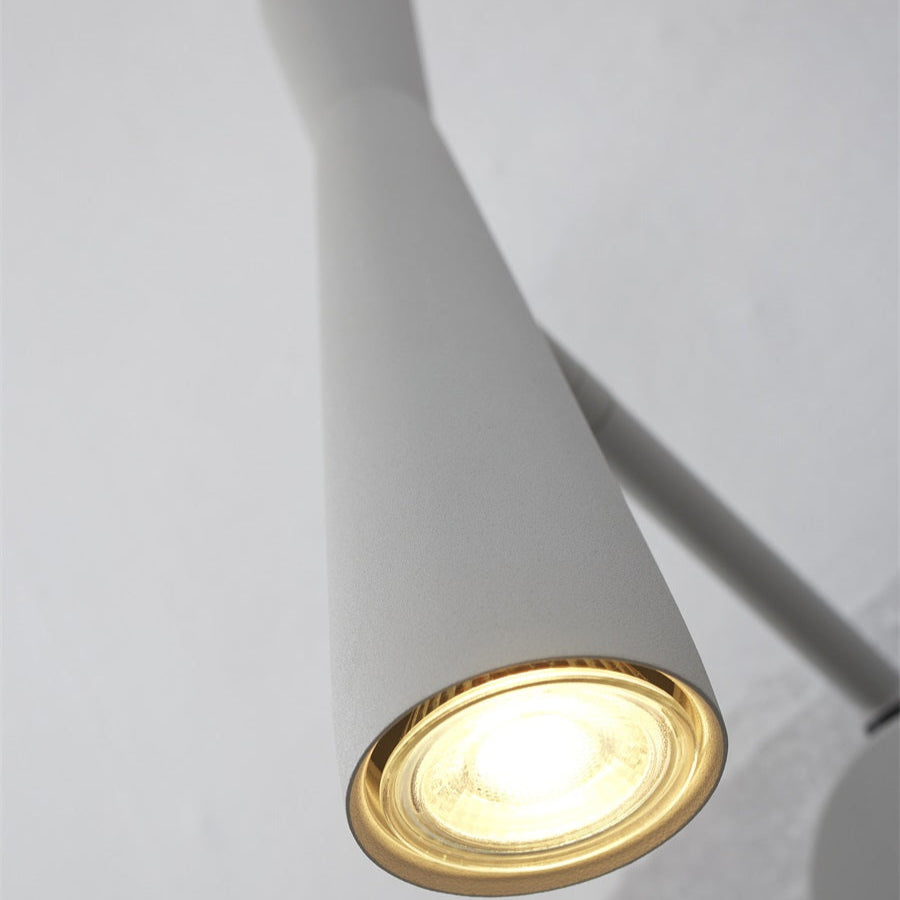 Modern ceiling light fixture with a gold interior on a white background