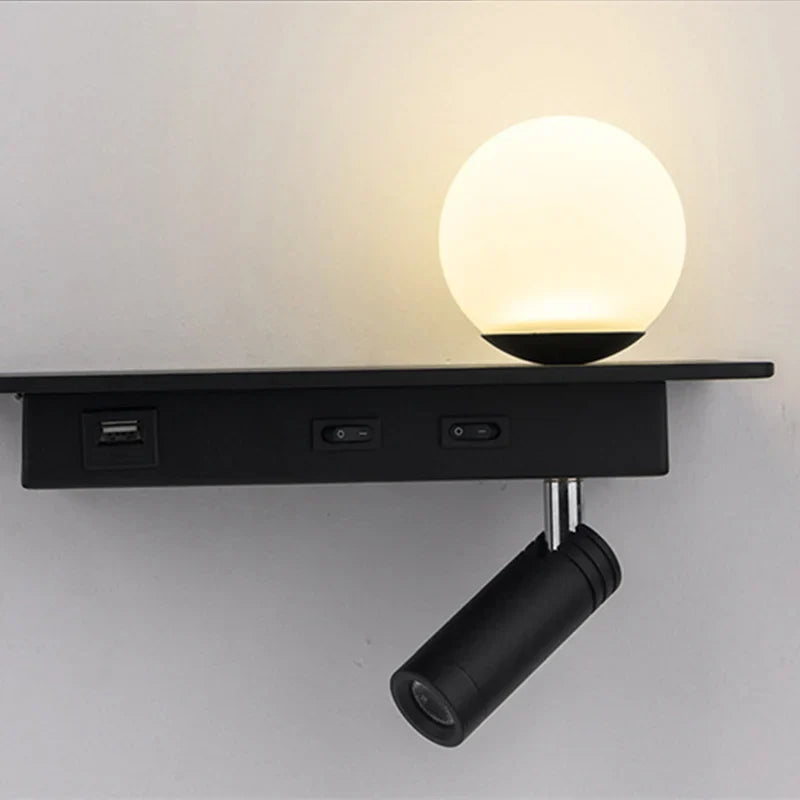Wall-mounted light fixture with USB ports on a white background