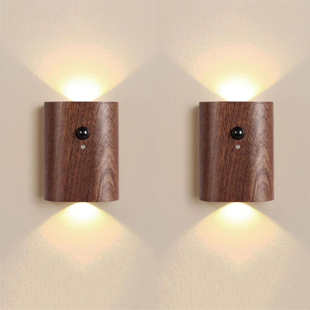 Two wooden wall lights on a beige wall