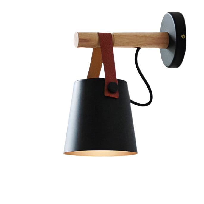 Wall-mounted lamp with black shade, wooden handle, and leather strap on a white background