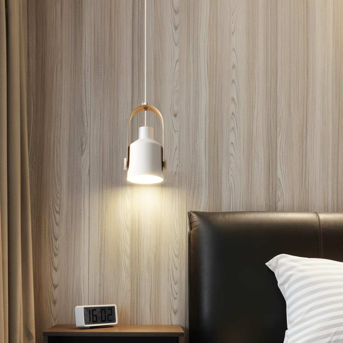 Pendant light fixture on a wooden wall with a bed and nightstand in the foreground