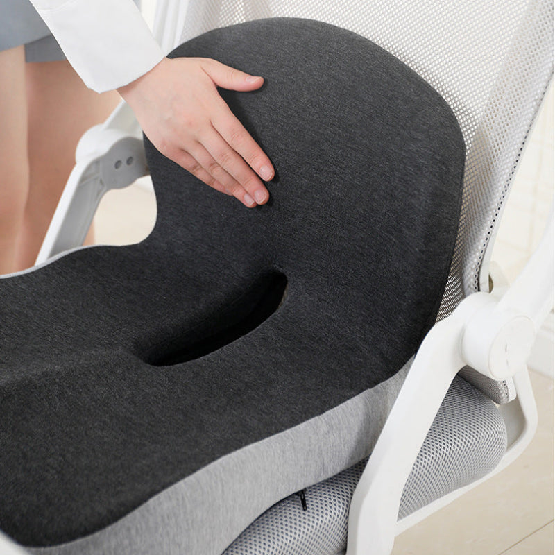 Black seat cushion on a chair