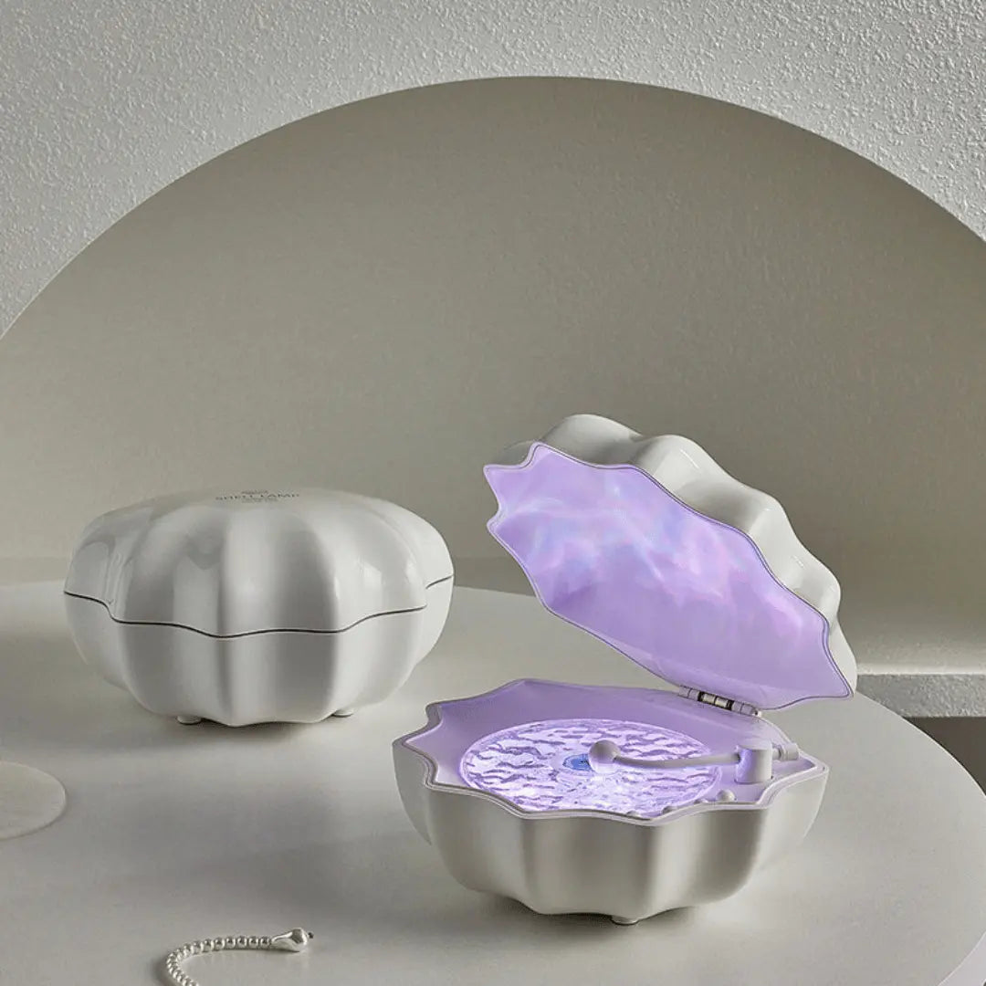 White jewelry box with a purple interior on a light gray surface.