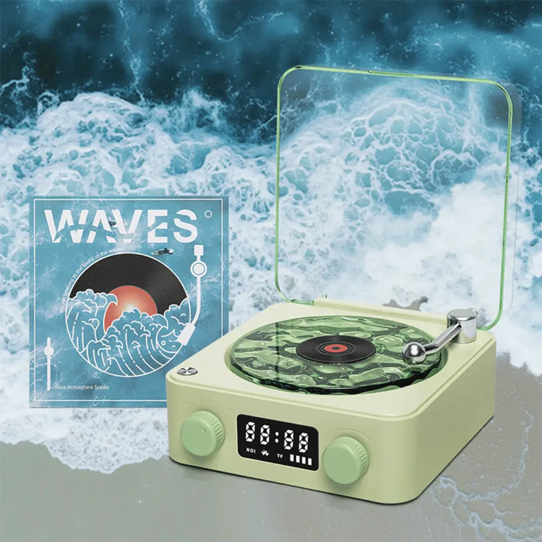 Green record player with a 'WAVES' album cover on a background of ocean waves.