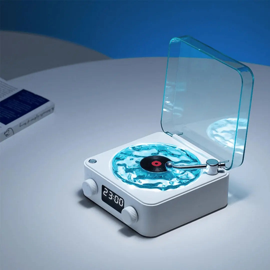 Modern turntable with digital display on a white surface with blue background