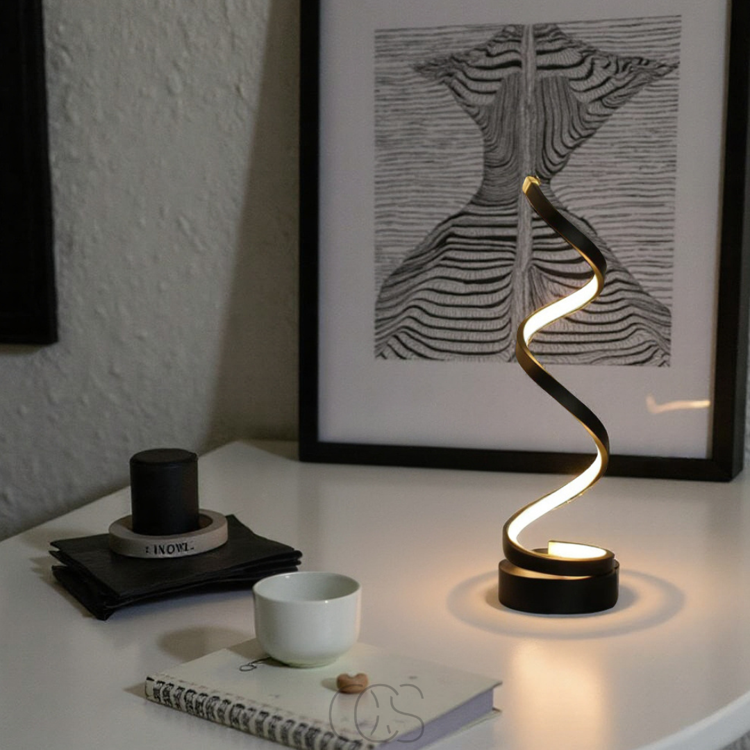 Modern table lamp with a decorative design on a bedside table.