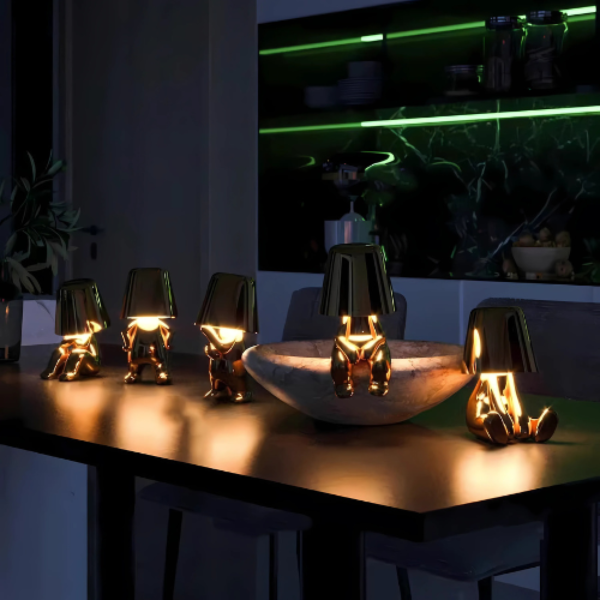 Decorative lamps on a table with a dark background