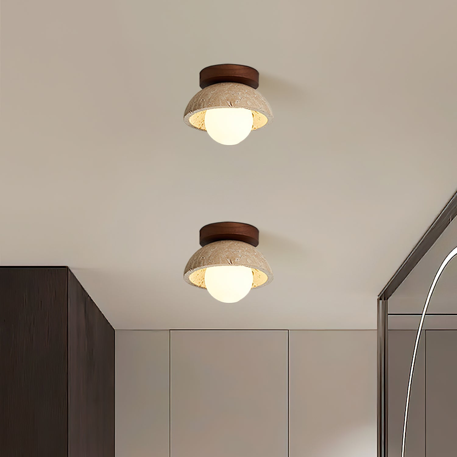 Two ceiling lights with wooden fixtures on a neutral ceiling.
