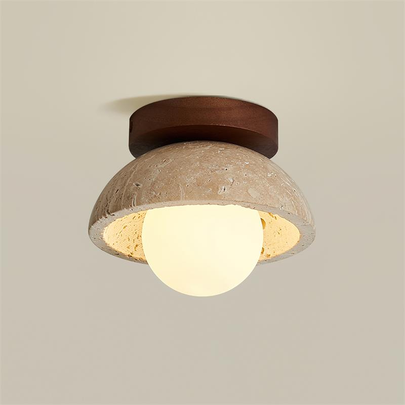 Ceiling light fixture with wooden top and textured concrete base on a plain background