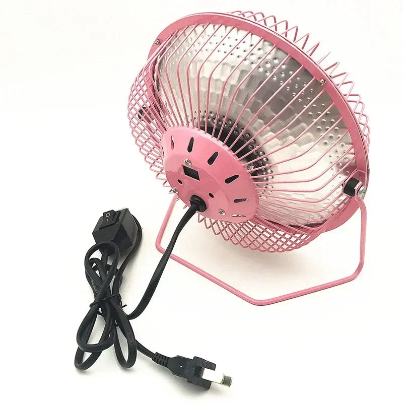 Pink desk fan with power cord on a white background