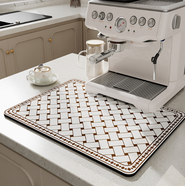 Espresso machine on a kitchen counter with a decorative mat