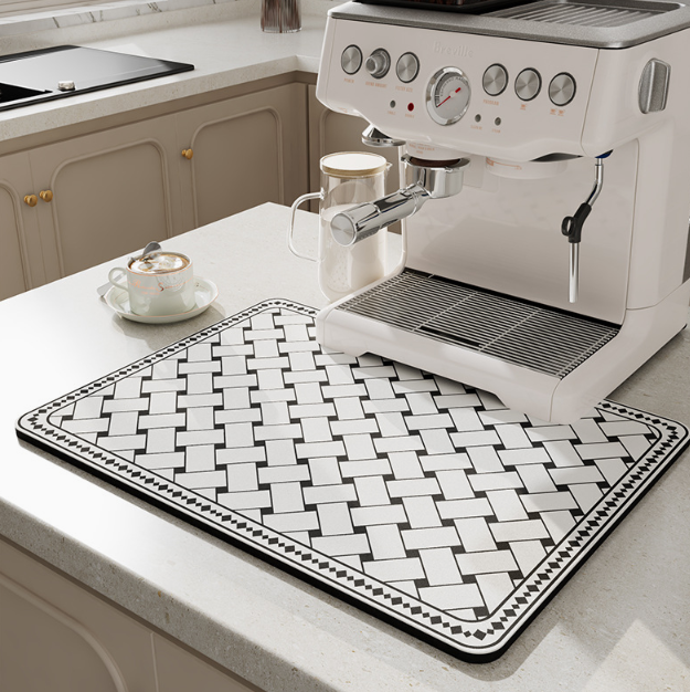 Espresso machine on a kitchen counter with a decorative mat