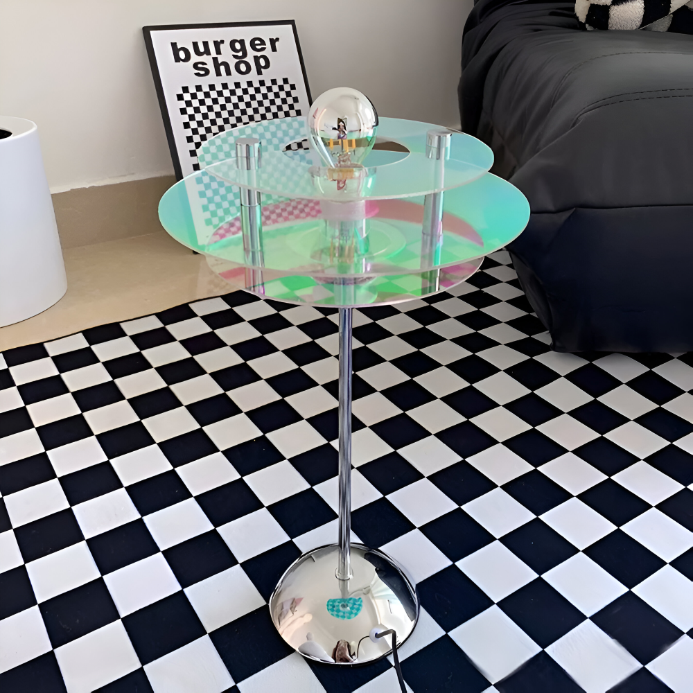 Holographic side table with a unique design on a checkered floor.