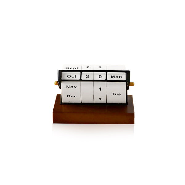 Perpetual calendar on a wooden base with a white background