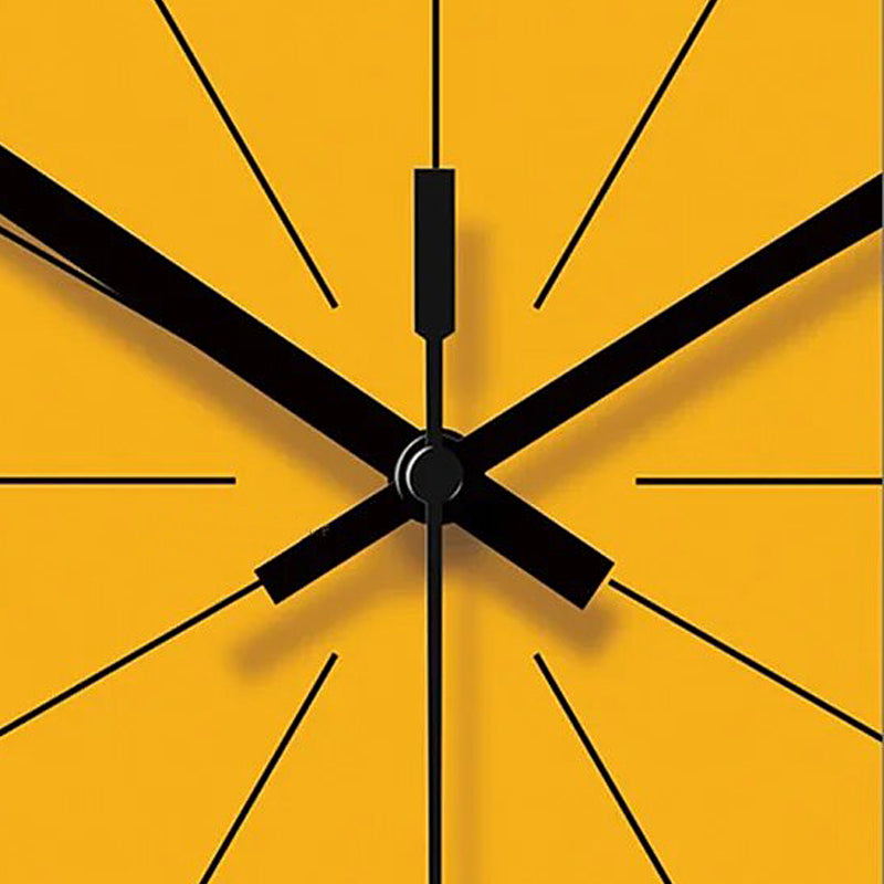 Black clock hands on a yellow background