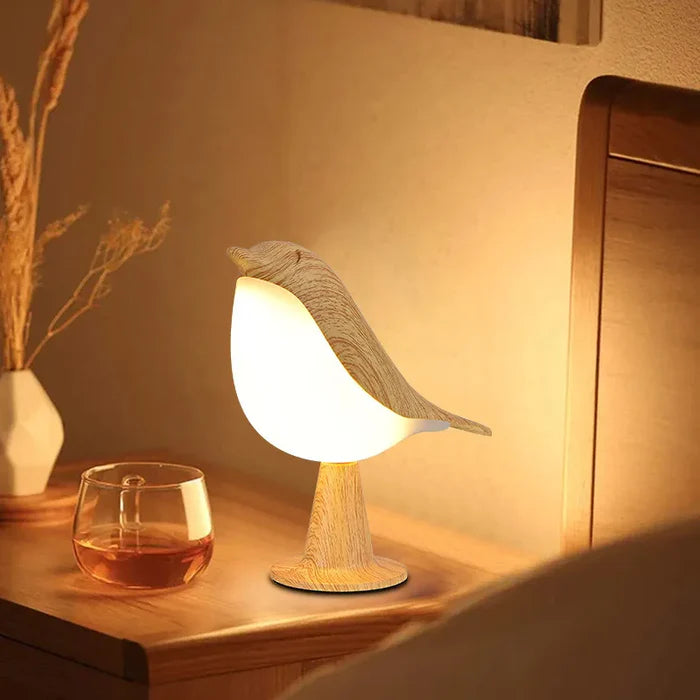 bird-shaped lamps on top with a warm glow.